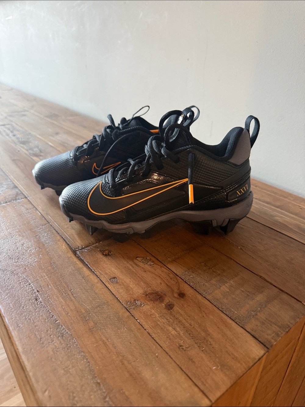 Nike Kids Black and Orange Turf/Spike Sneakers